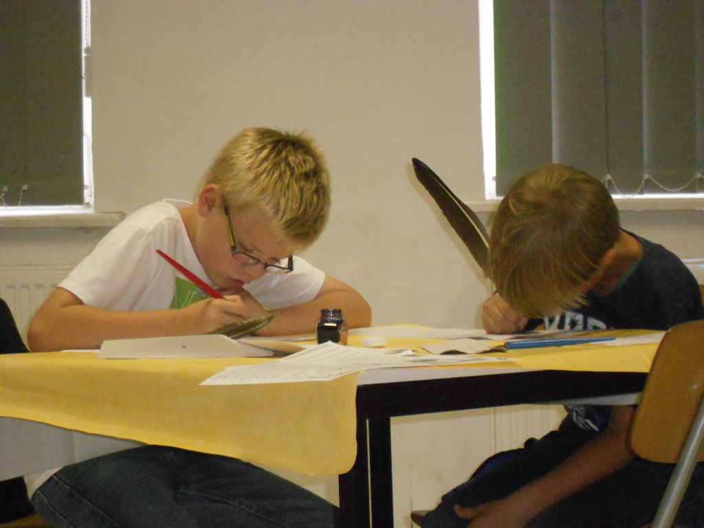 Children's programme: With slate and quill pen